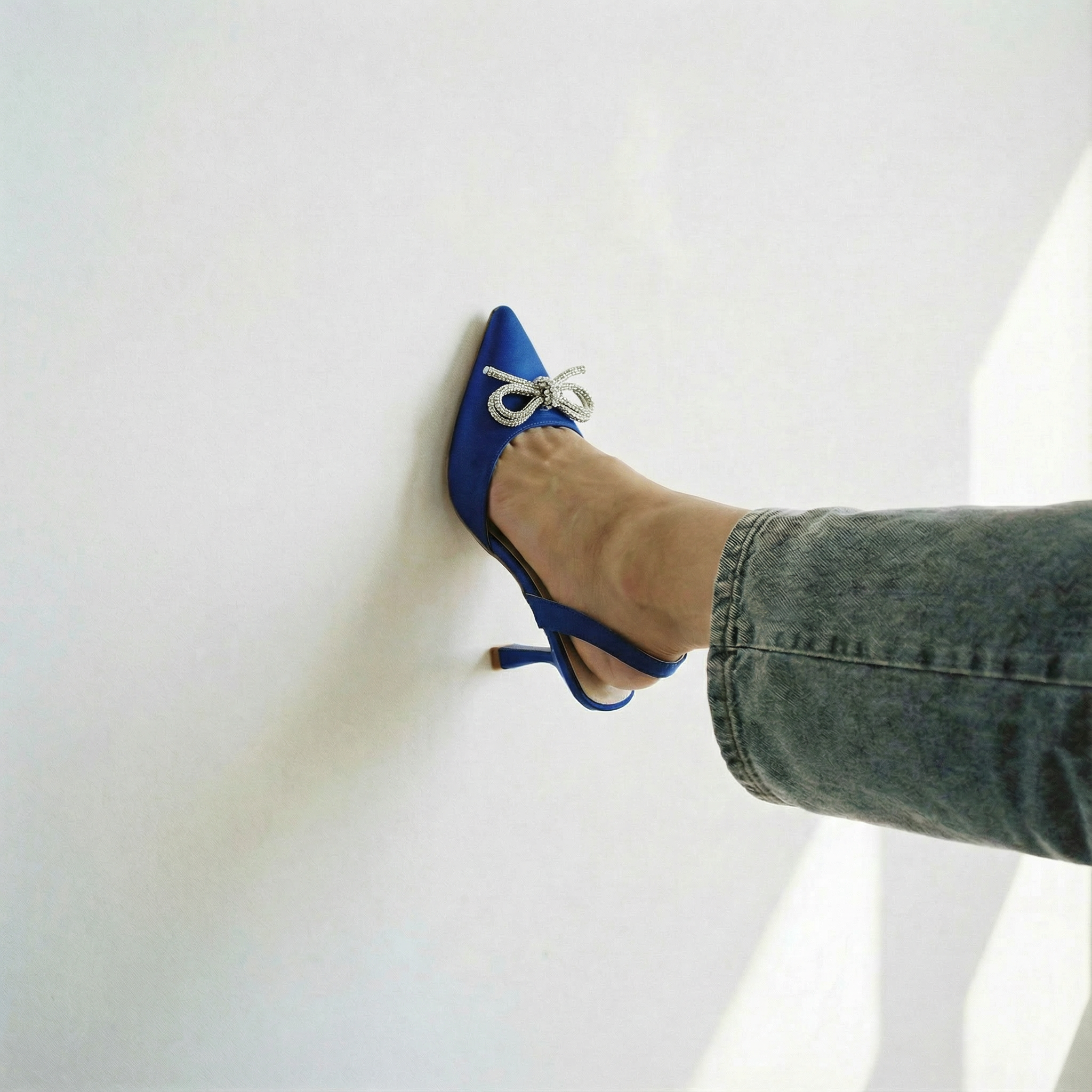 The Tyra Crystal Bow Slingback Heels