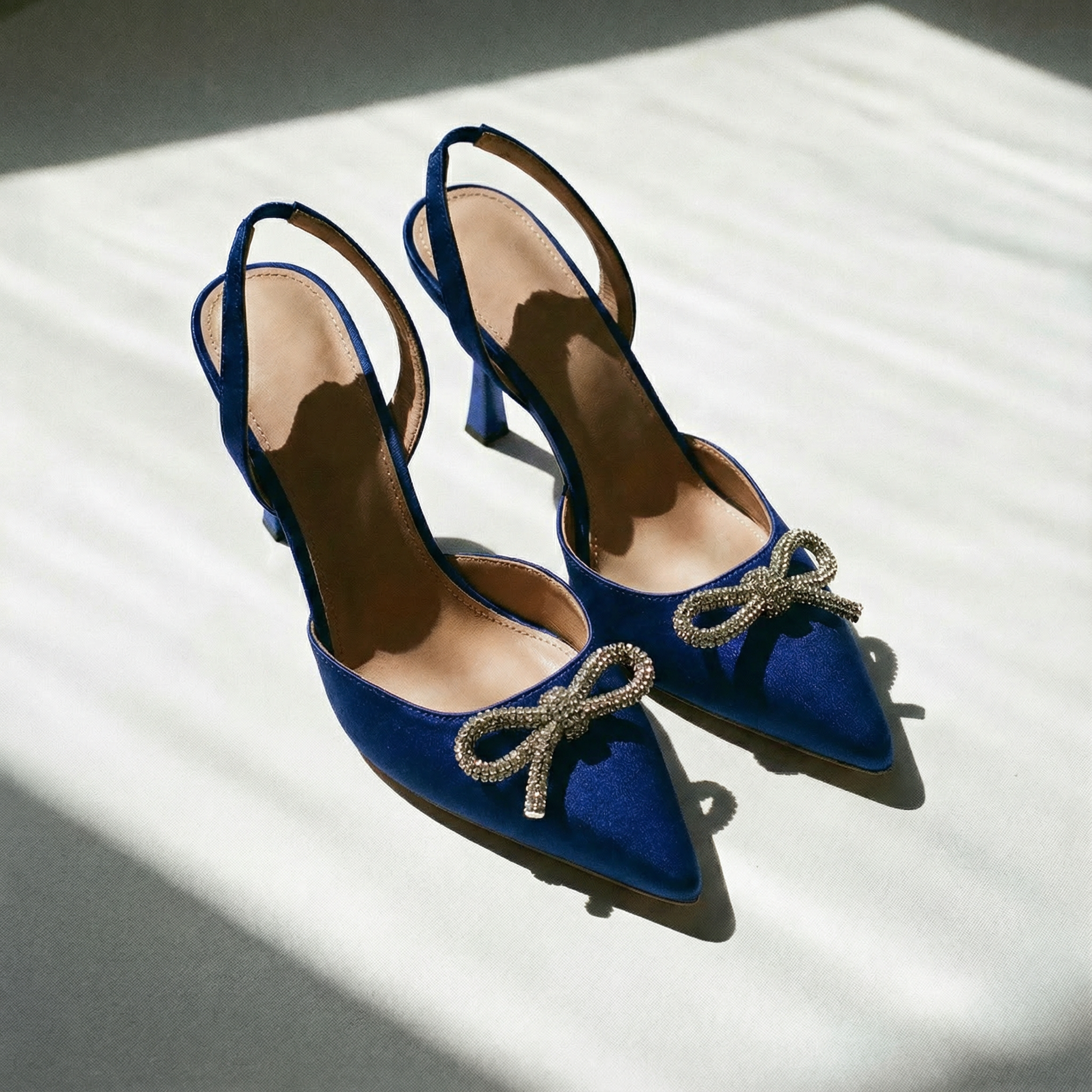 The Tyra Crystal Bow Slingback Heels