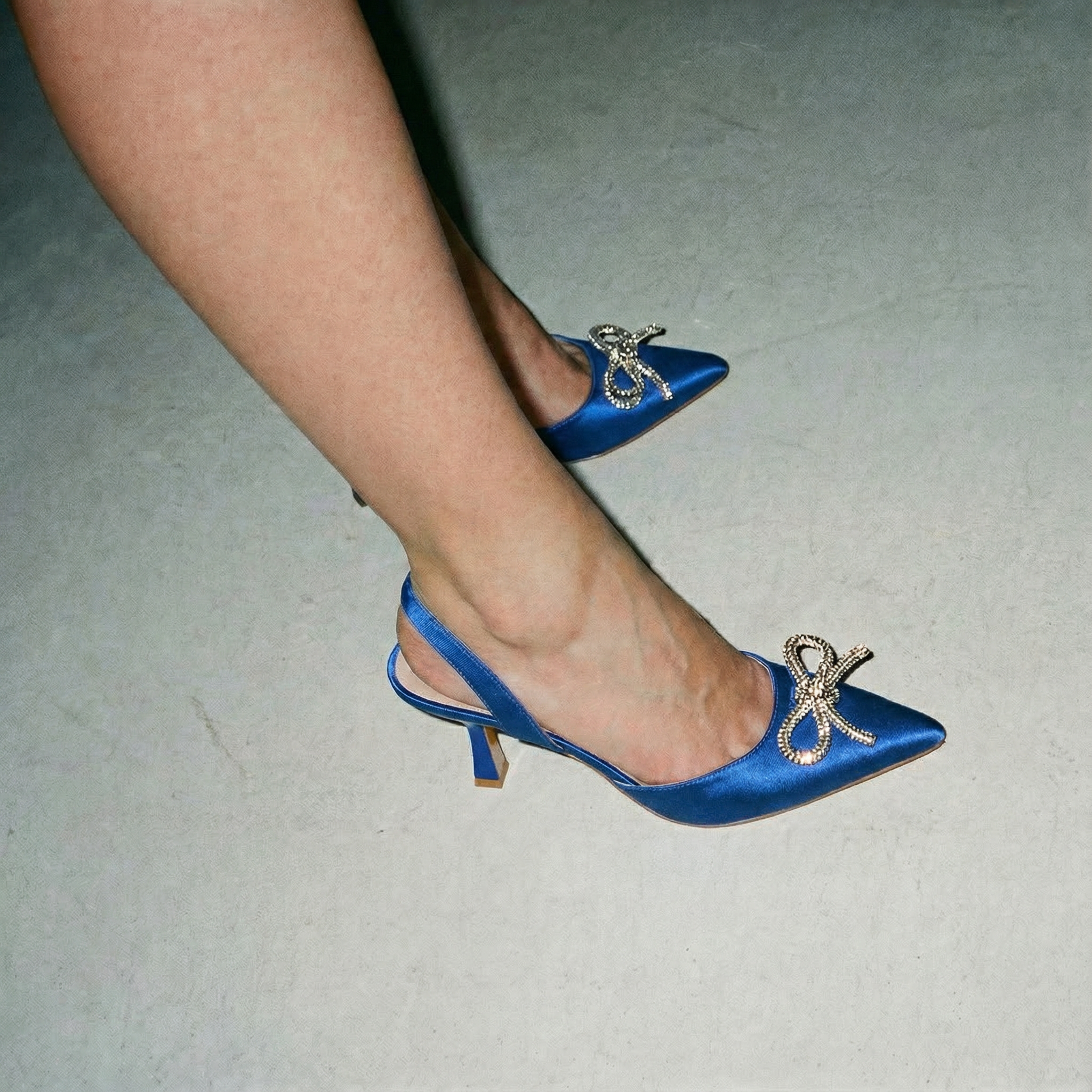 The Tyra Crystal Bow Slingback Heels