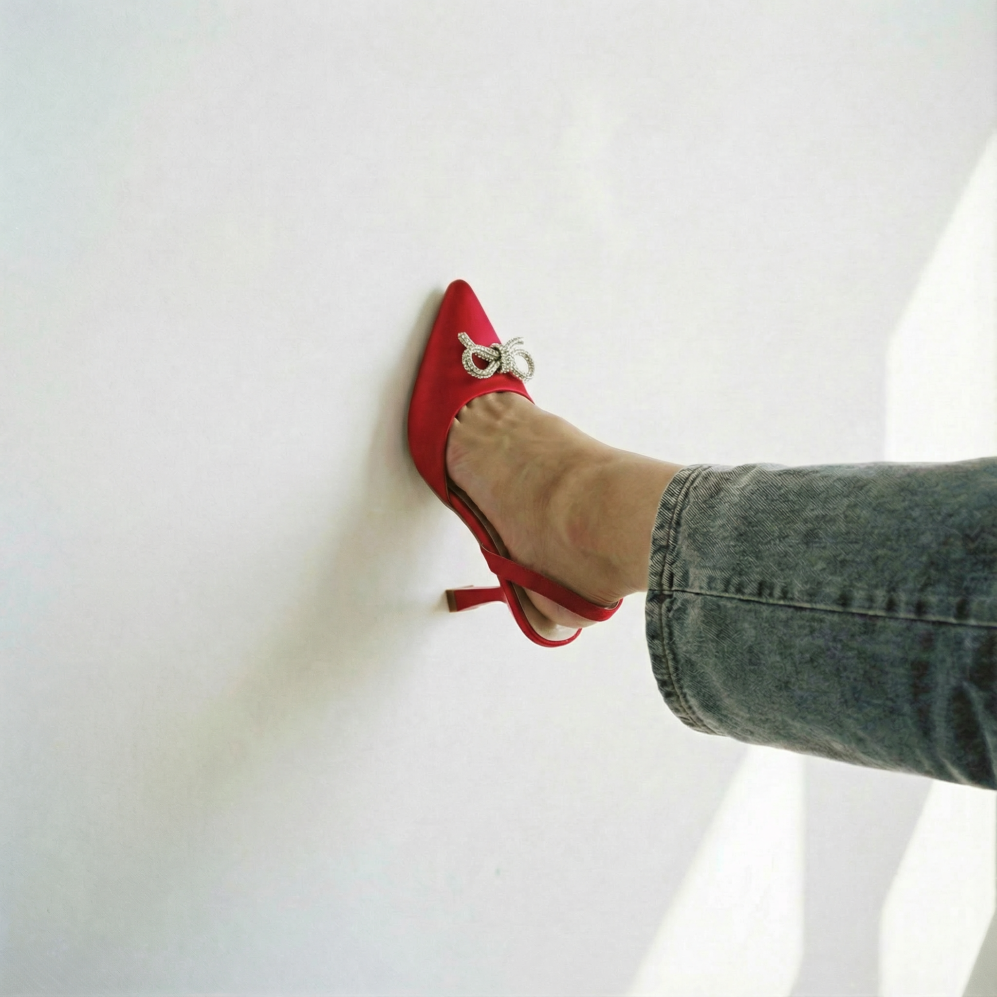 The Tyra Crystal Bow Slingback Heels