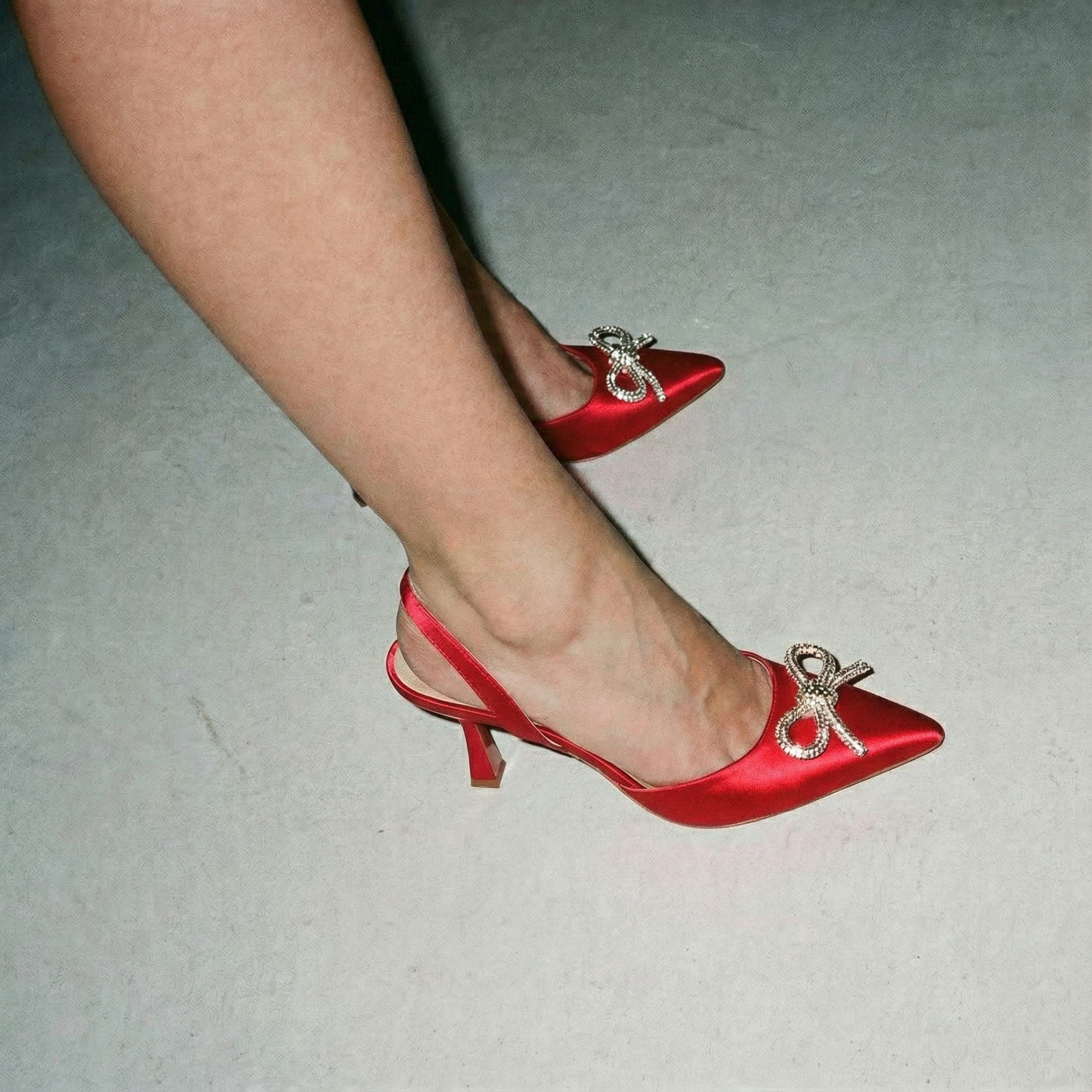 The Tyra Crystal Bow Slingback Heels