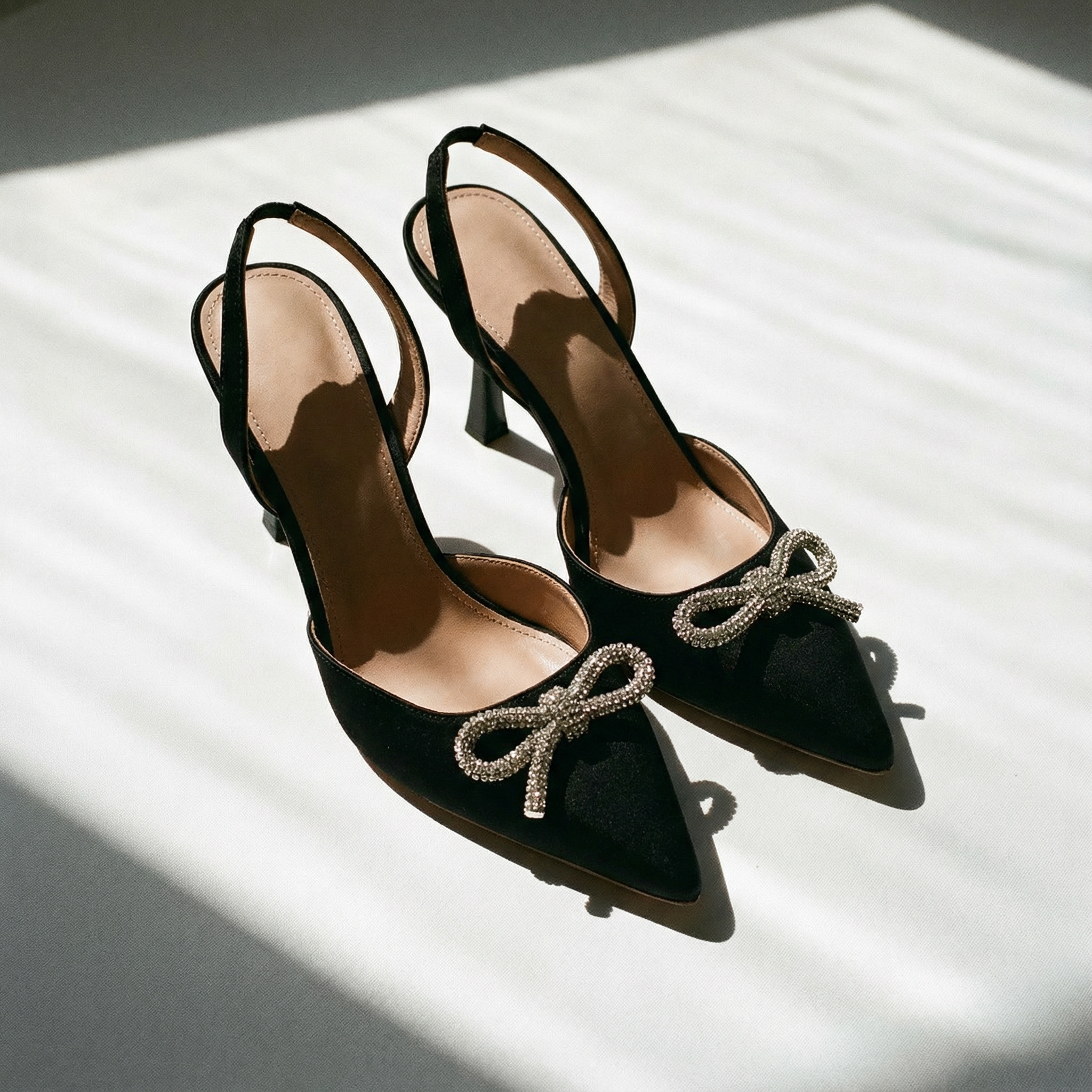 The Tyra Crystal Bow Slingback Heels