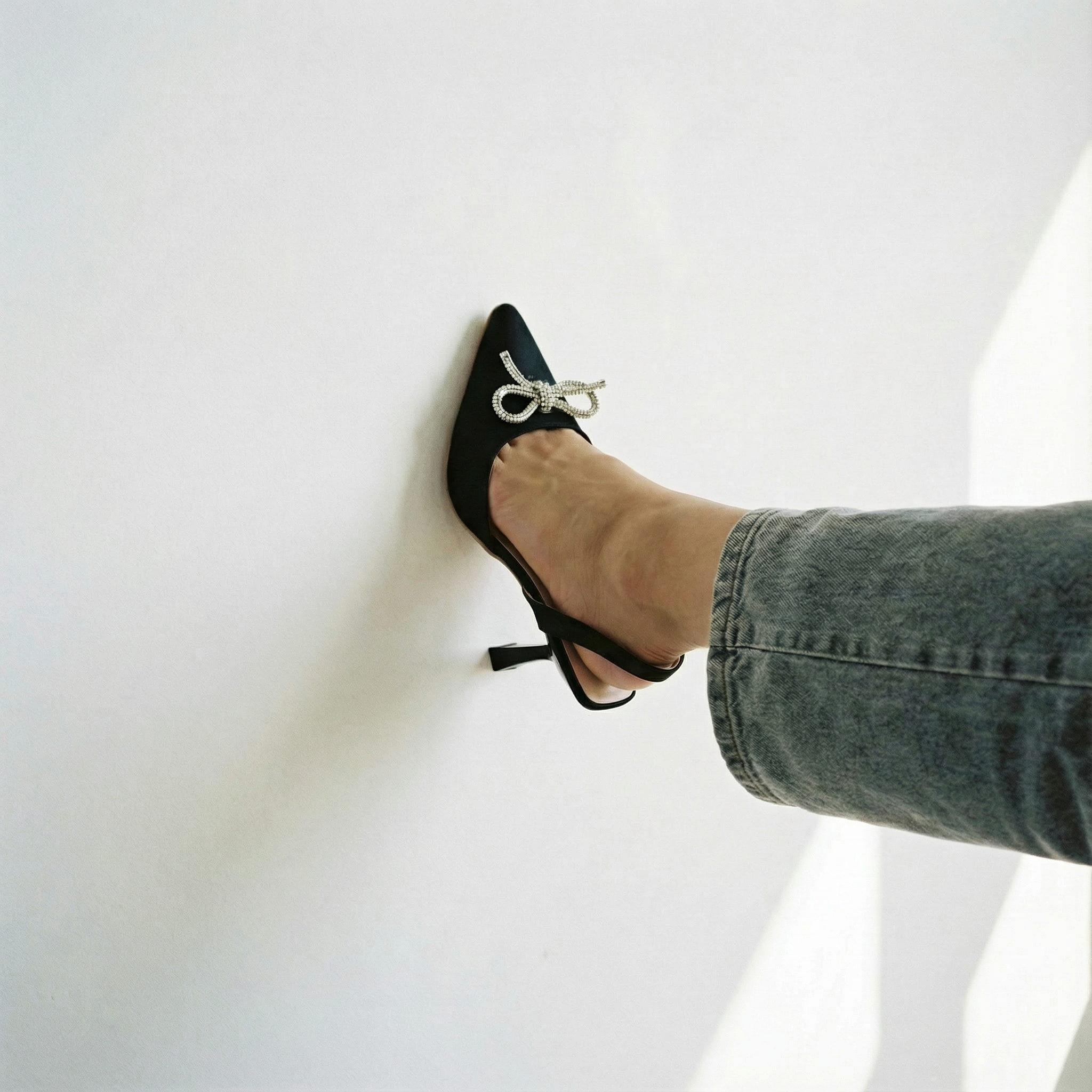 The Tyra Crystal Bow Slingback Heels