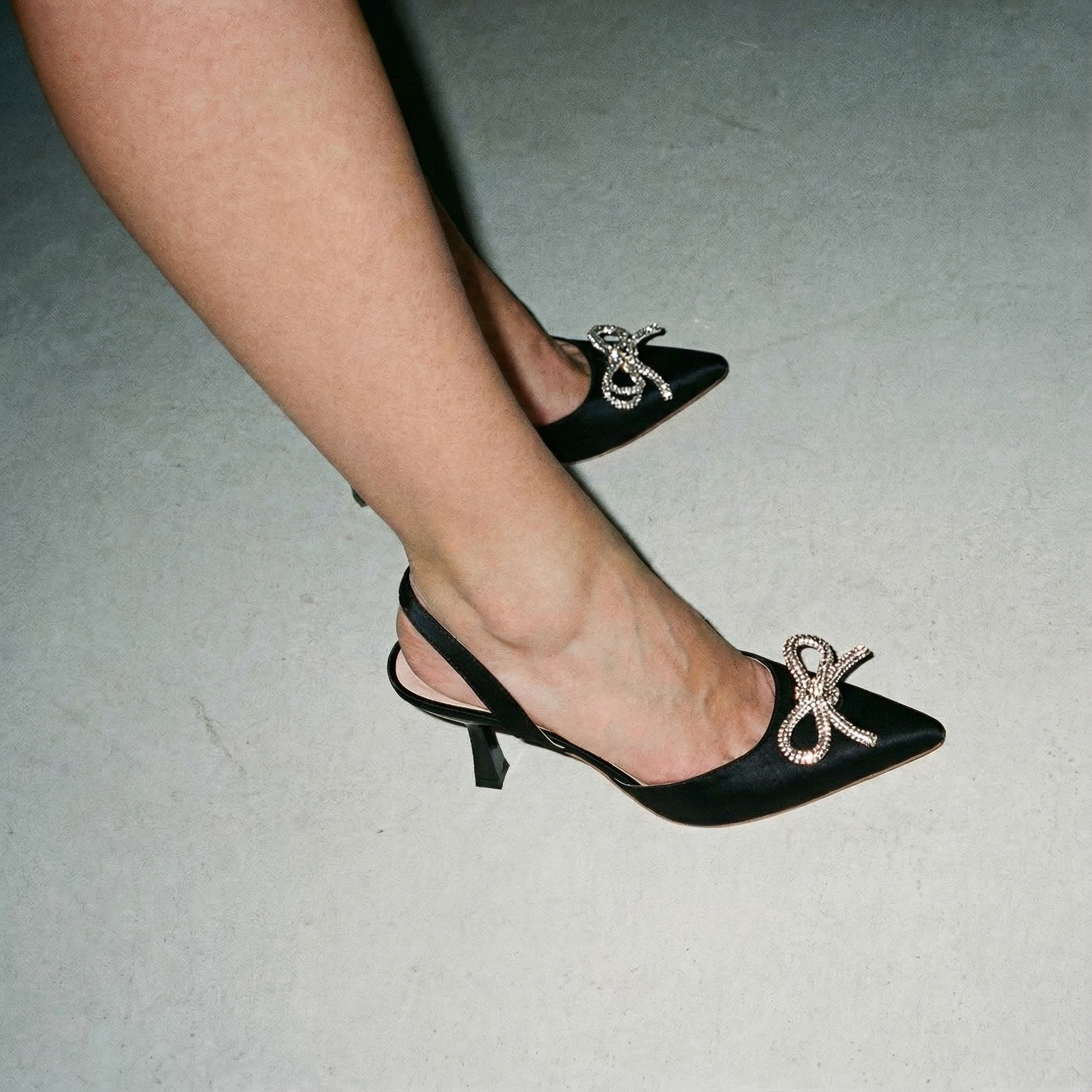 The Tyra Crystal Bow Slingback Heels