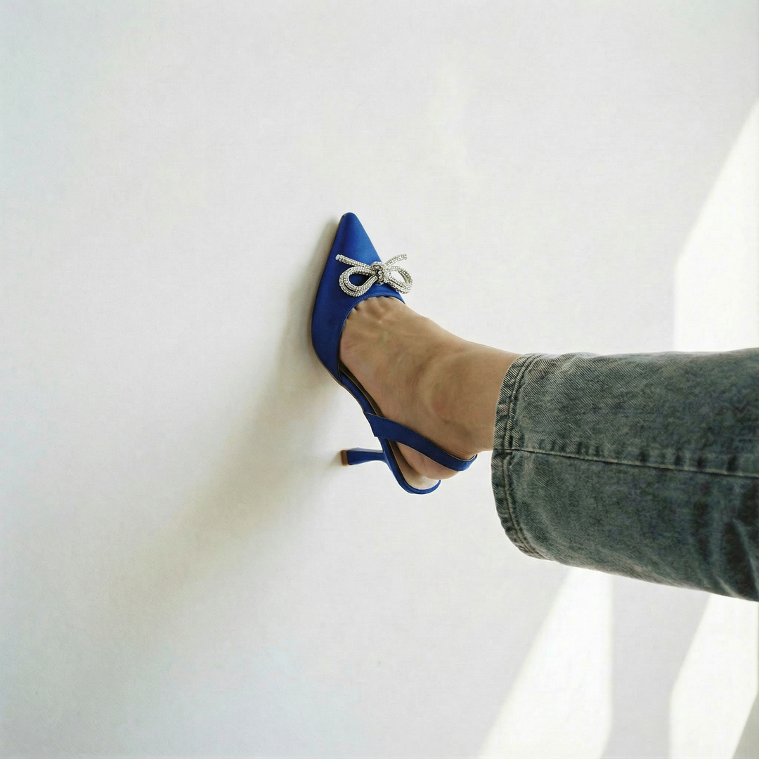 The Tyra Crystal Bow Slingback Heels