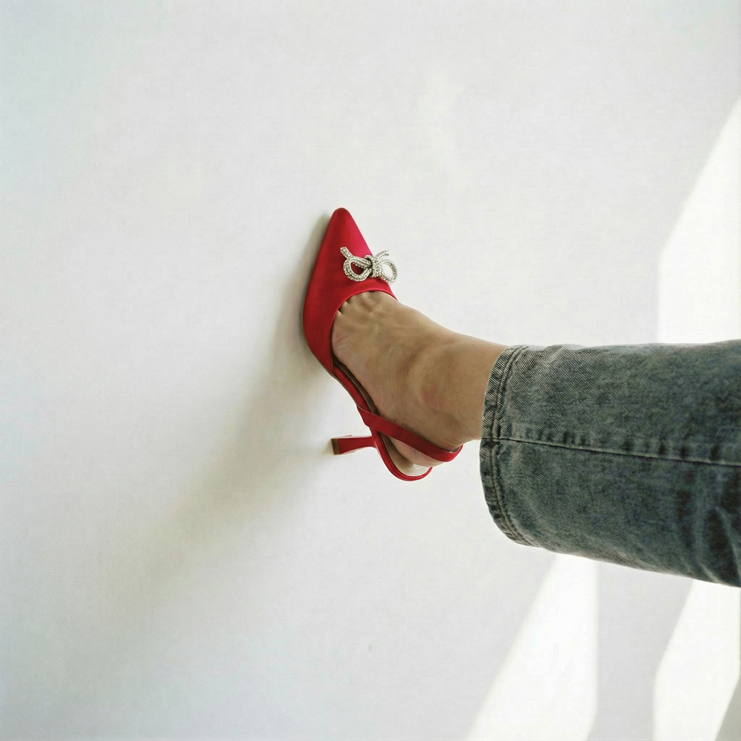 The Tyra Crystal Bow Slingback Heels