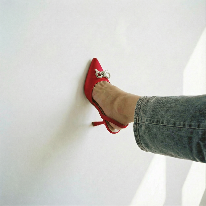 The Tyra Crystal Bow Slingback Heels